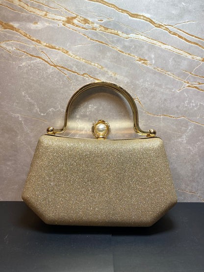 GRAND STONED GOLDEN HANDBAG